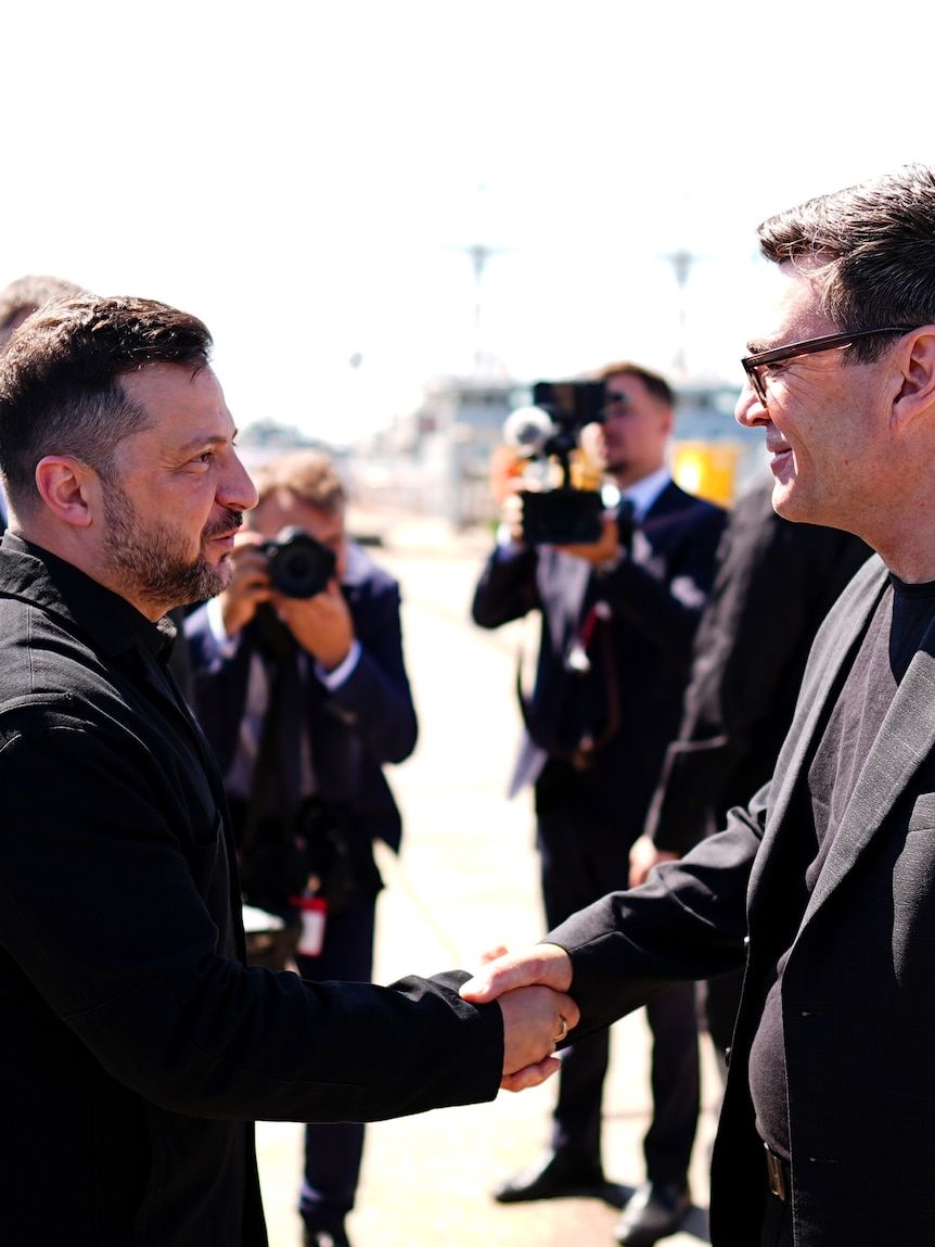 Britain's Prime Minister Andy Burnham greets Ukraine's President Volodymyr Zelenskyy at HM Naval Base in Portsmouth. - Aaron Chown via AP