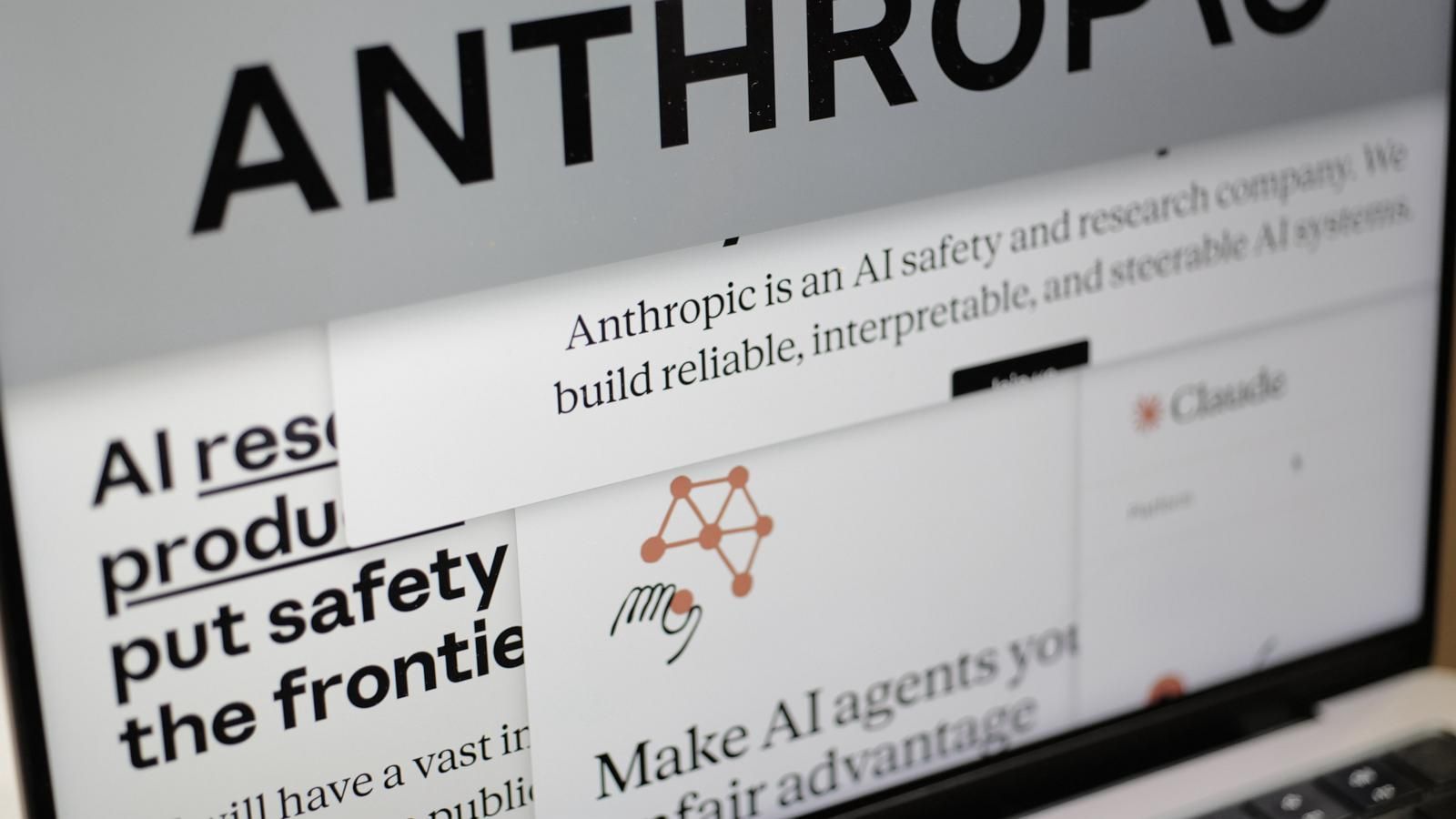 Pages from the Anthropic website and the company's logo are displayed on a computer screen in New York, Feb. 26, 2026. - AP Photo/Patrick Sison