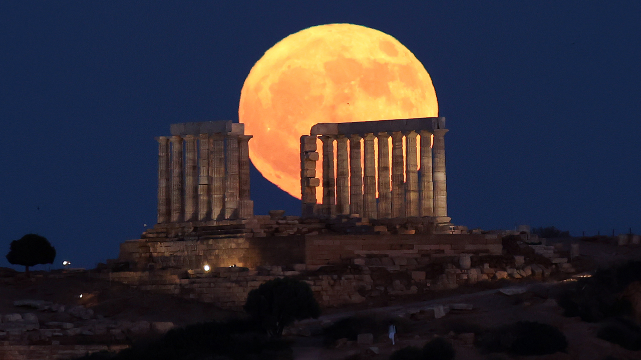 A full moon rising in Greece; Live Science noted the Buck Moon would be one of the lowest-hanging full moons of the year in the Northern Hemisphere. - Anadolu via Getty Images