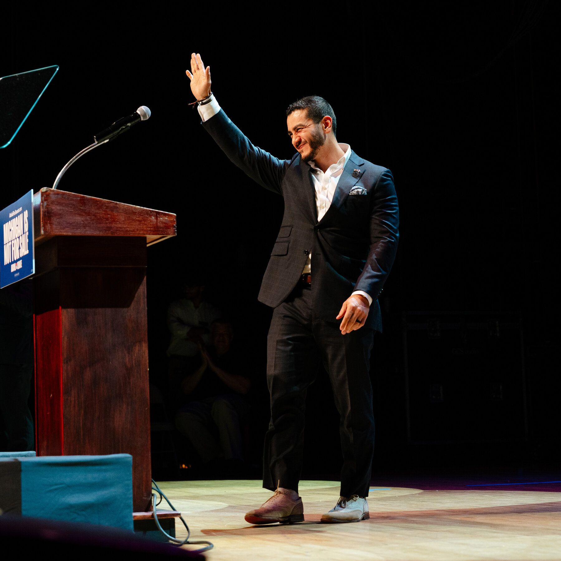 Dr. Abdul El-Sayed greeting the audience at his election watch party in Detroit. - The New York Times