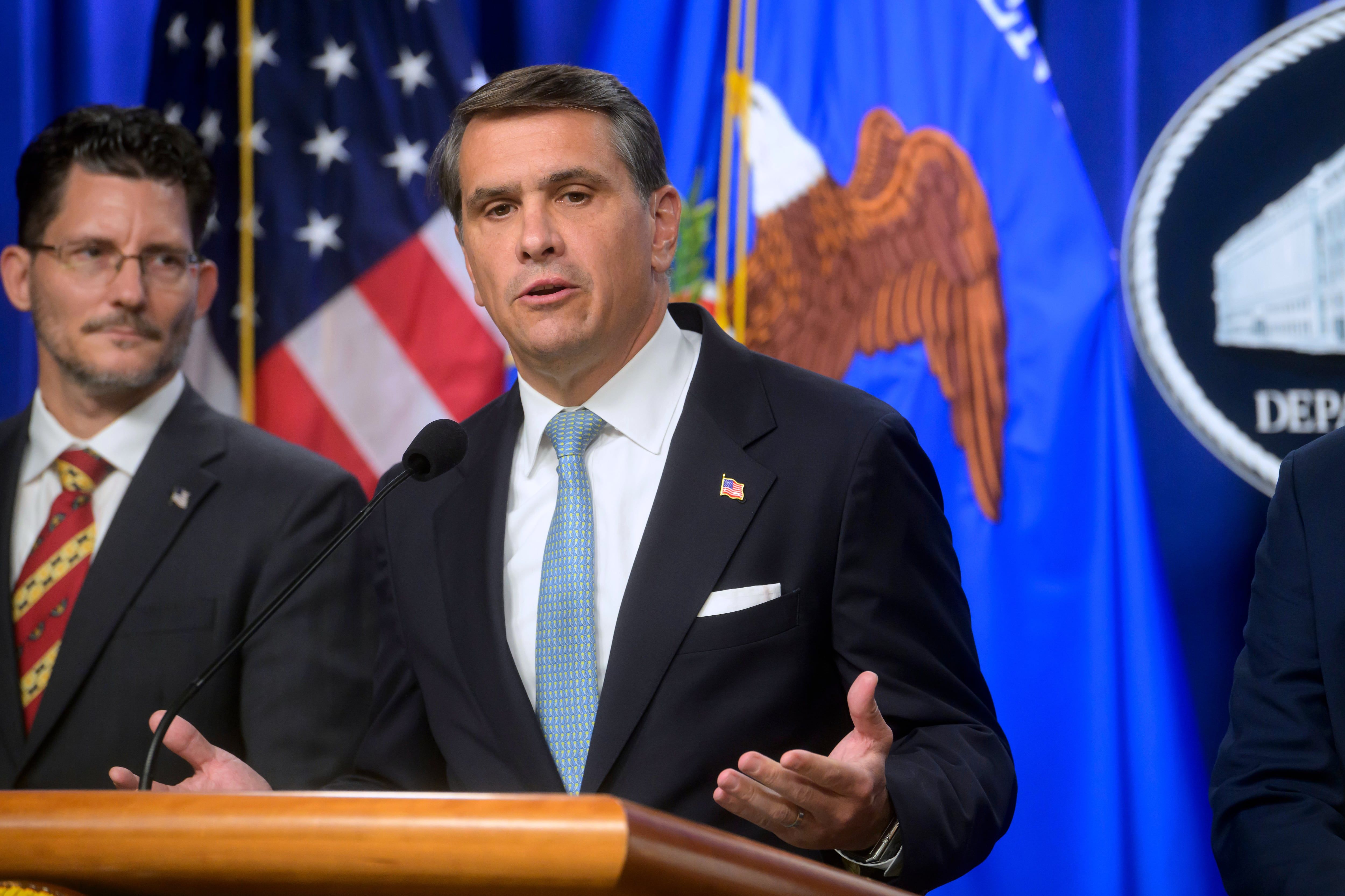 Acting Attorney General Todd Blanche, right, appears at a Justice Department news conference in Washington on August 5, 2026. - AP Photo/Rod Lamkey, Jr.