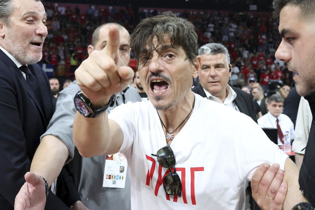 Panathinaikos owner Dimitris Giannakopoulos reacts before the basketball league finals Game 2 between Olympiacos and Panathinaikos at Peace and Friendship Stadium, in Piraeus, Greece, on June 1, 2025. - InTime Sports via AP