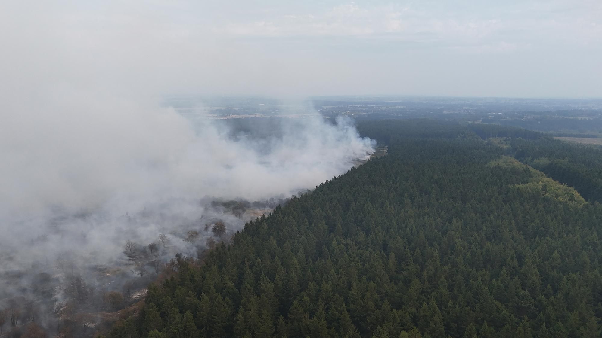 A wildfire burns in the Hautes Fagnes nature reserve in Waimes, Belgium, on August 15, 2026. - Dimitri Korczak/AFP