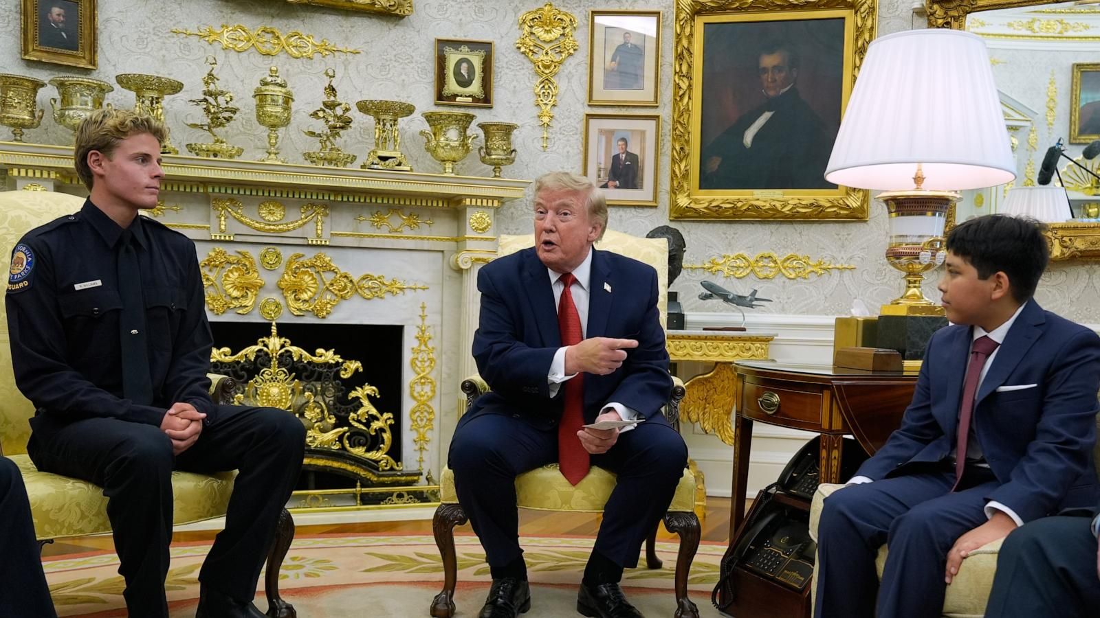 President Trump meets with lifeguard Ryder Williams and Nathaniel Rai in the Oval Office. - AP Photo/Manuel Balce Ceneta