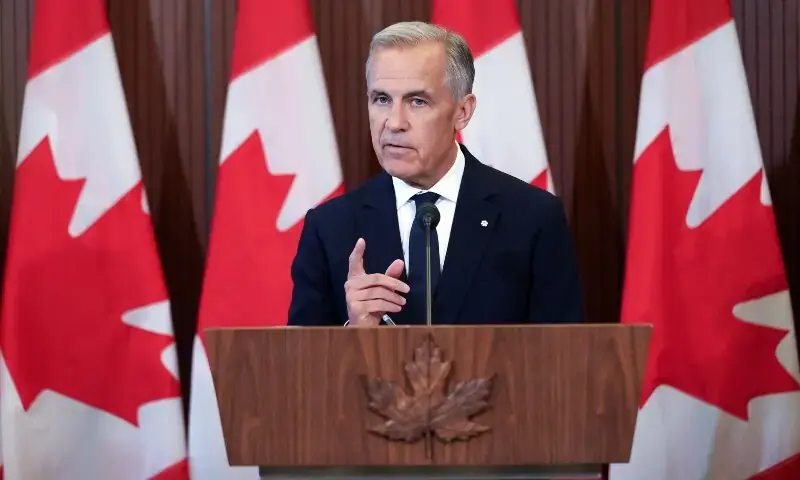 Canadian Prime Minister Mark Carney speaks at a press conference in Ottawa, Ontario, Canada on August 22, 2026, after a collapse in trade talks with the U.S. - AFP
