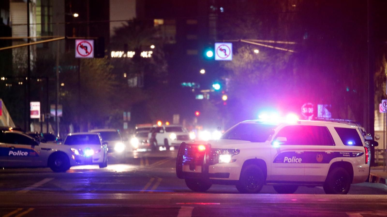 Phoenix Police Department vehicles block off a street in Phoenix in a file photo. - AP Photo/Ross D. Franklin