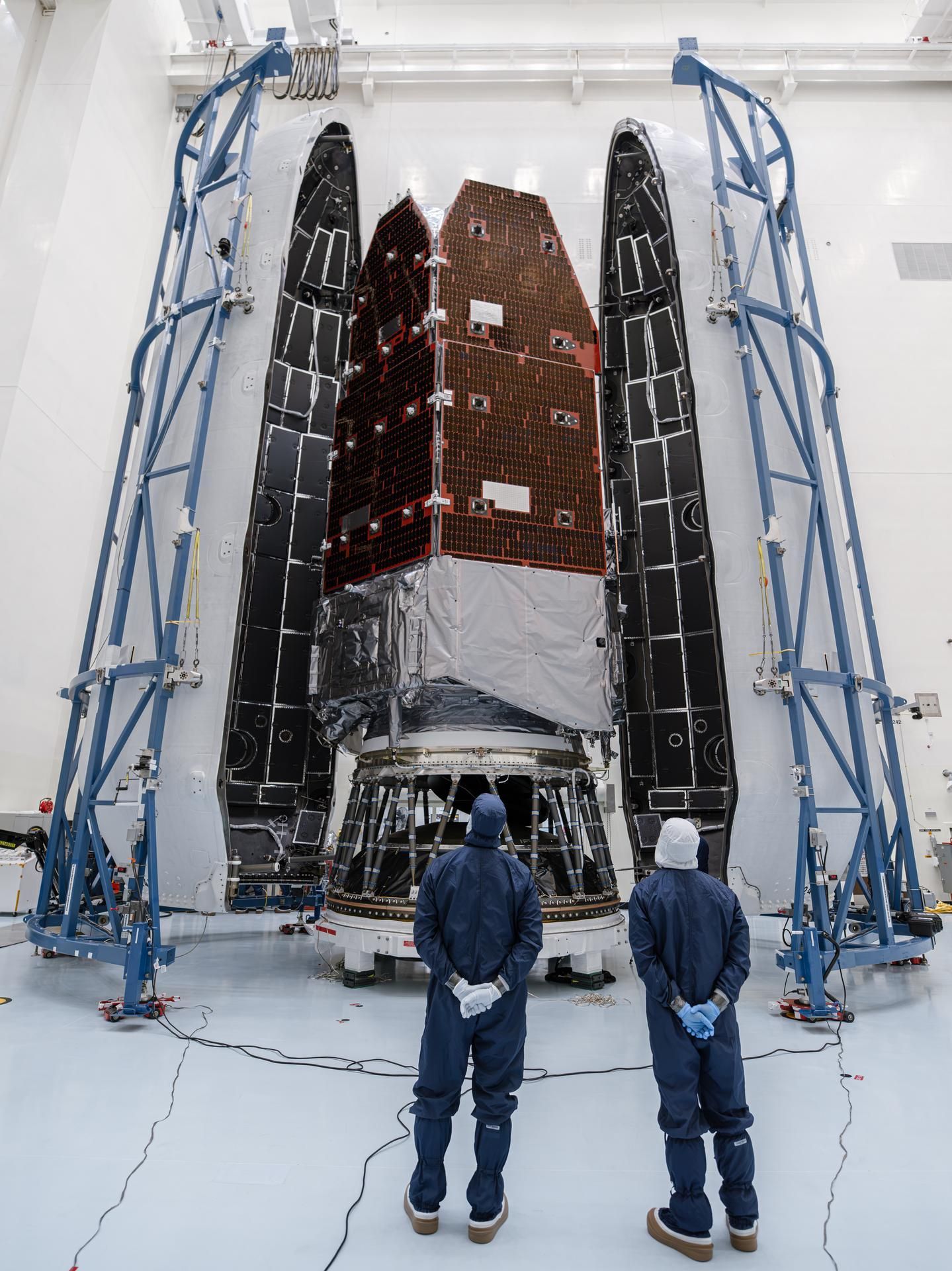 NASA’s Nancy Grace Roman Space Telescope is encapsulated within the payload fairing at Kennedy Space Center ahead of mating to a SpaceX Falcon Heavy rocket. - NASA/Sydney Rohde (Rocz)