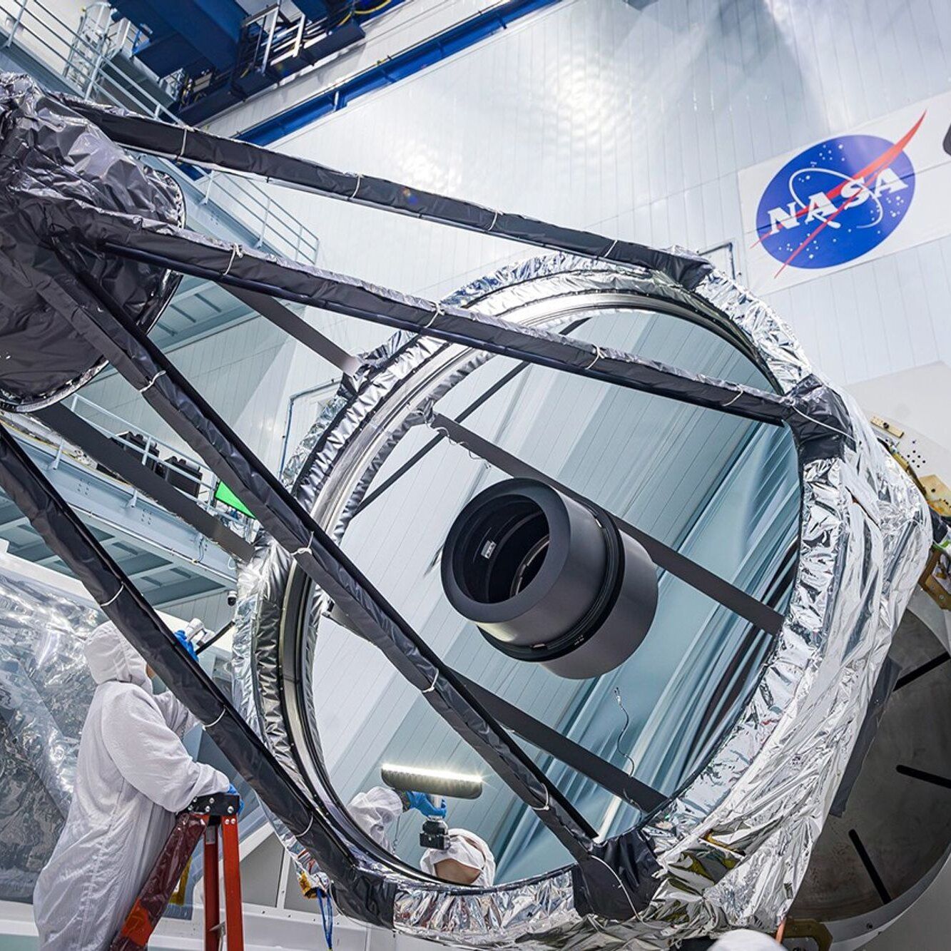 Inspecting the surface of the Nancy Grace Roman Space Telescope's primary mirror before launch. - NASA