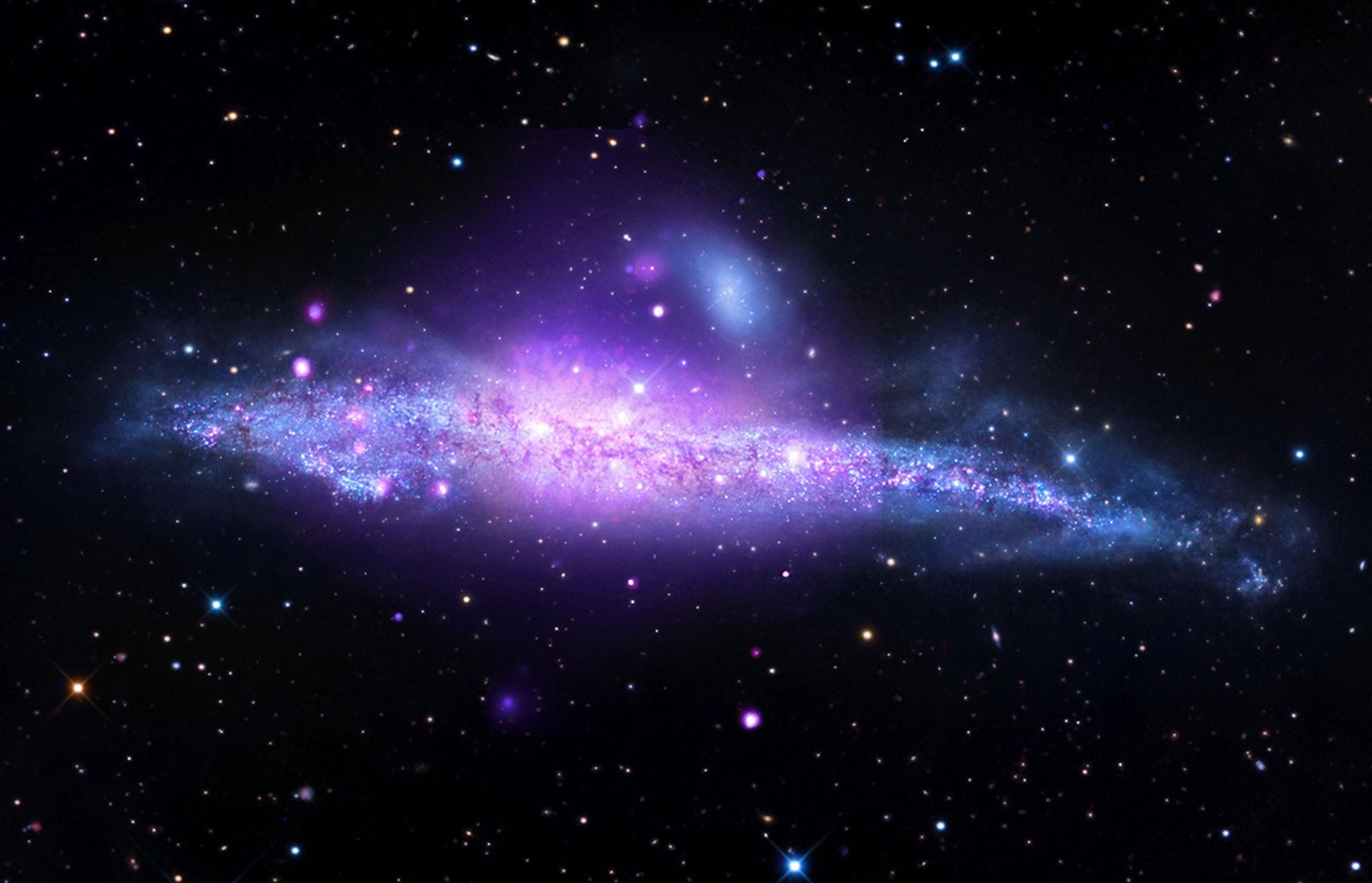 NASA image associated with Chandra observations of galaxies in the hypersoft X-ray source study. - NASA