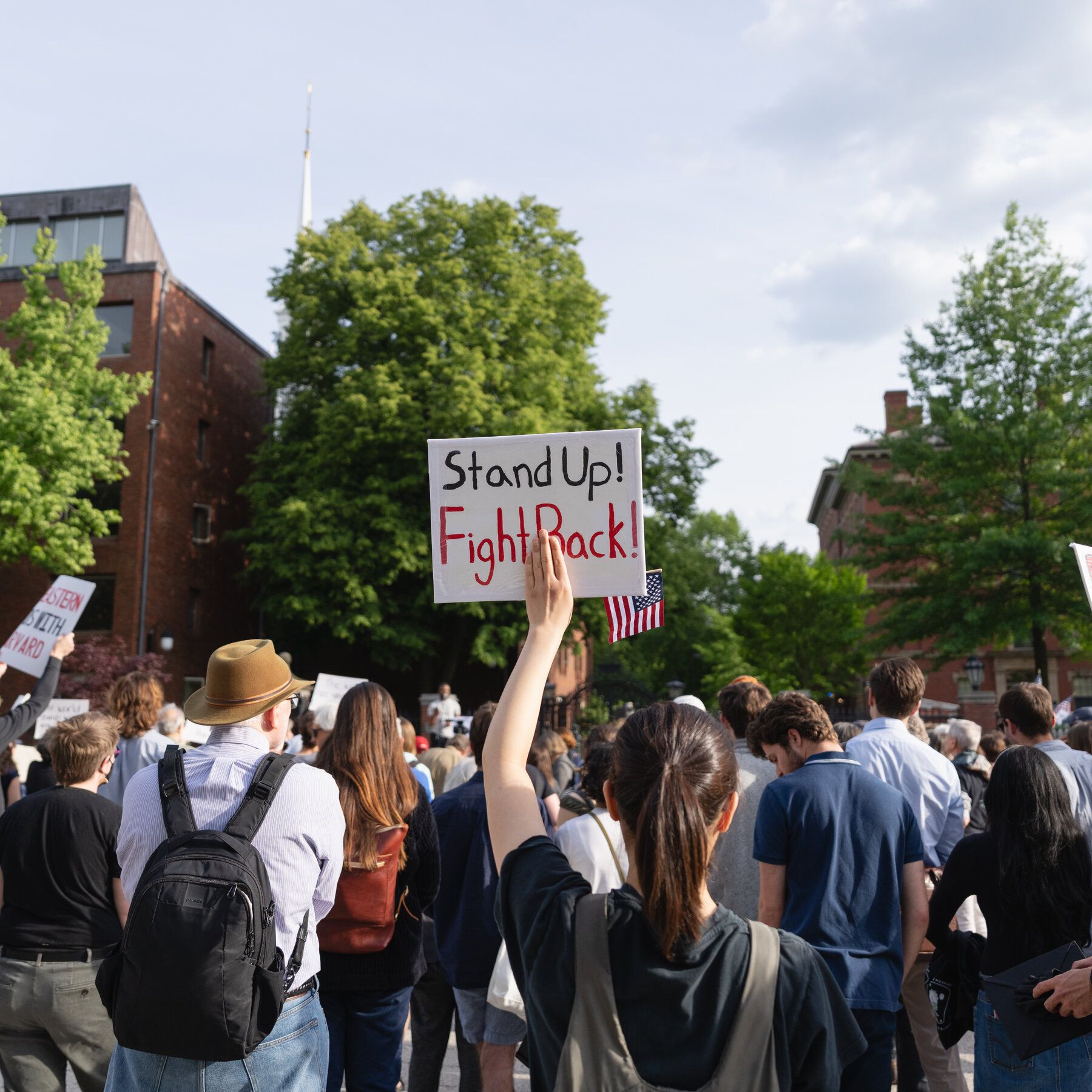 A rally supporting international students at Harvard University. - The New York Times